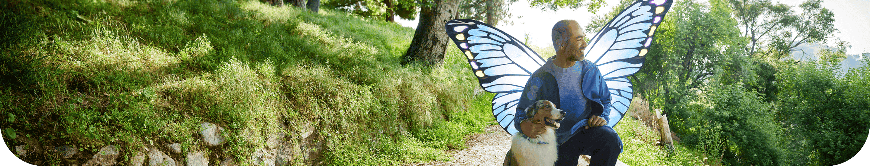 A man outside with his dog